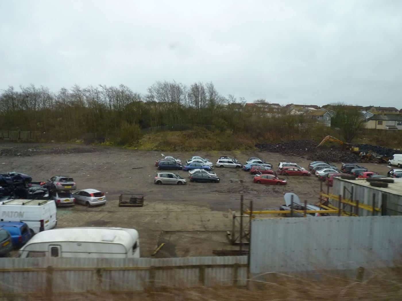 Rows of cars at a vehicle scrapyard